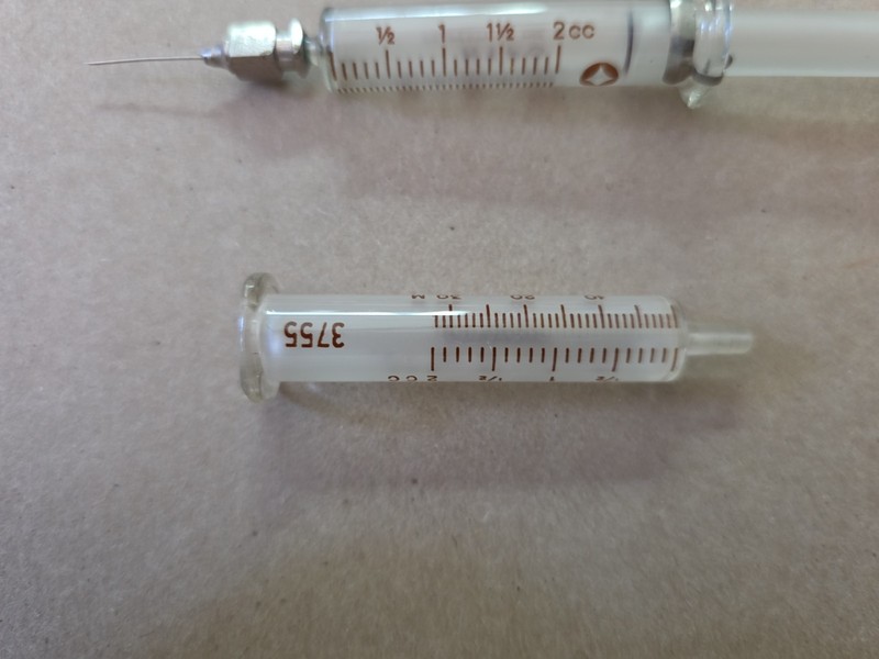 VTG Ideal and Hypo Medical Glass 2cc Syringe Military War History marked gallery