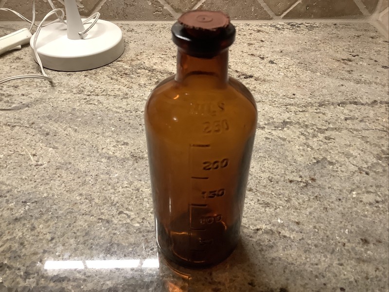 Vintage Medical Bottle w/rstopper 6 inches tall x 2 1/4 wide - Amber Color 744 gallery