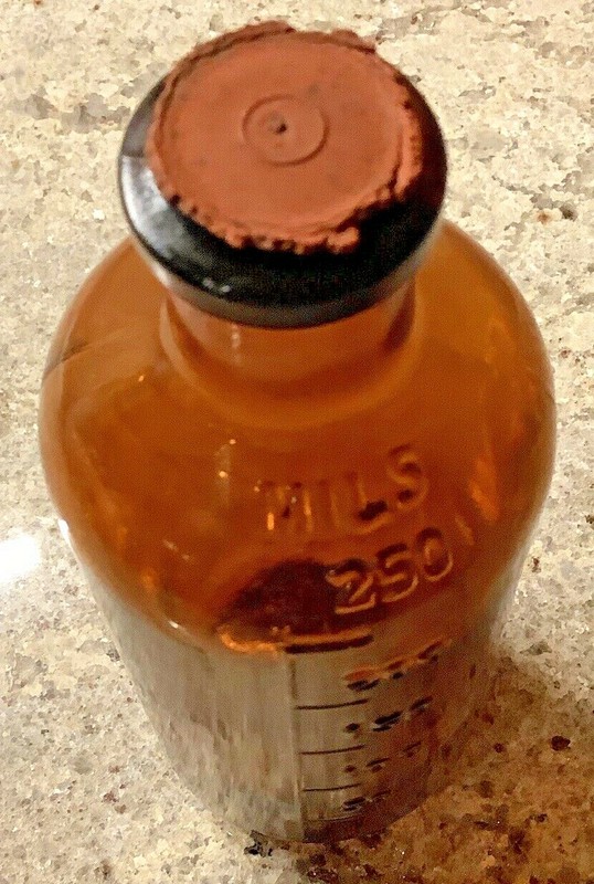 Vintage Medical Bottle w/rstopper 6 inches tall x 2 1/4 wide - Amber Color 744 gallery