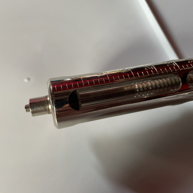 Vintage Metal syringe glass vial 50cc. Incomplete. gallery