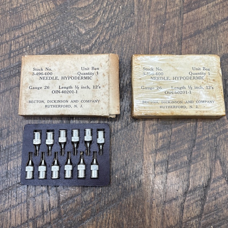 Two packs of hypodermic needles vintage 1940s new total of 24 needles