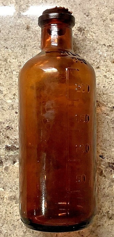Vintage Medical Bottle w/rstopper 6 inches tall x 2 1/4 wide - Amber Color 744 gallery