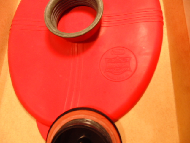 Older Rexall Defender molder rubber ice cap with box gallery