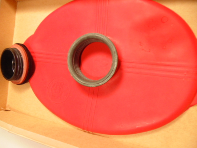 Older Rexall Defender molder rubber ice cap with box gallery