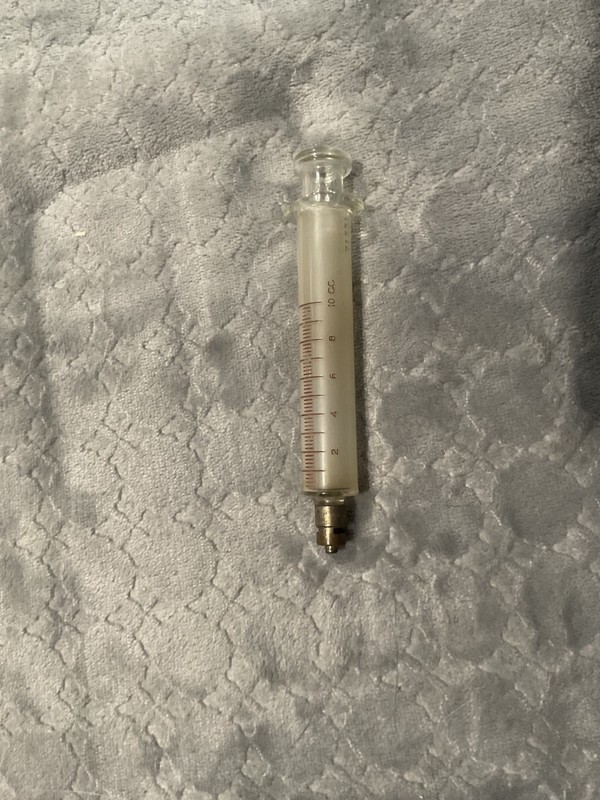 antique glass syringe no needle with this one 10 cc
