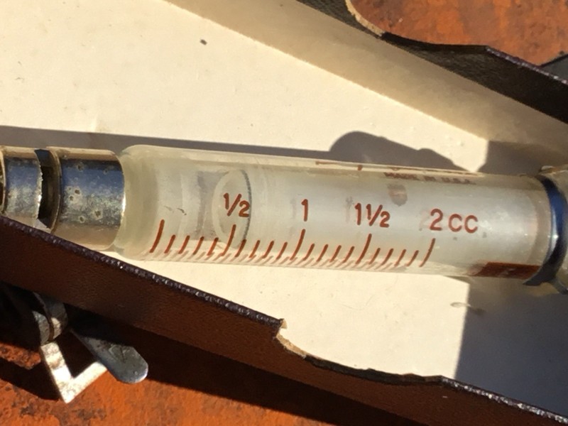 Antique Never Used Large Capacity Brightly Colored Logo Syringe gallery
